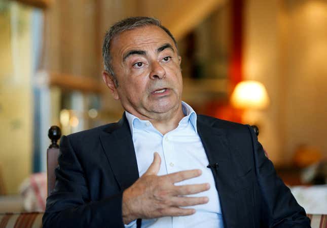 Fugitive former car executive Carlos Ghosn, gestures as he talks during an interview with Reuters in Beirut, Lebanon