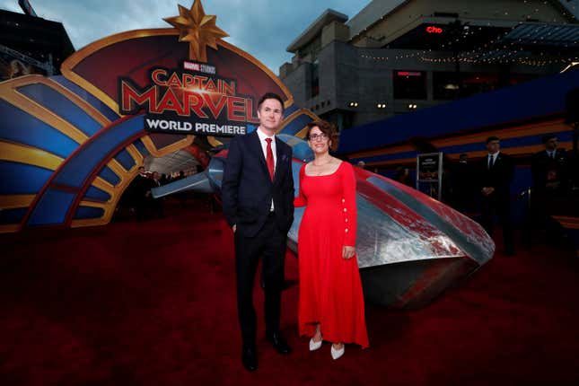 Co-directors Anna Boden and Ryan Fleck pose at the premiere for the movie "Captain Marvel"  on the red carpet.